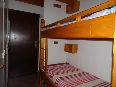 Un ou plusieurs lits dans un hébergement de l'établissement Studio ensoleillé, 4 pers, terrasse - FR-1-464-115