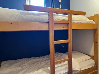 Un ou plusieurs lits dans un hébergement de l'établissement À louer : Appartement centre, 3 pièces, idéal famille - FR-1-464-126
