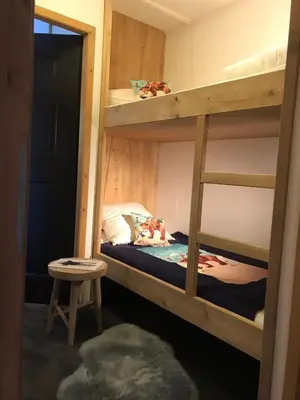 Un ou plusieurs lits dans un hébergement de l'établissement Arc 1950 - Appartement 2 chambres - Ski-in & out - Grande Terrasse Ensoleillée