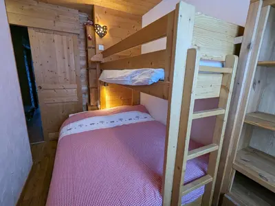 Un ou plusieurs lits dans un hébergement de l'établissement Appartement au lac ski aux pieds