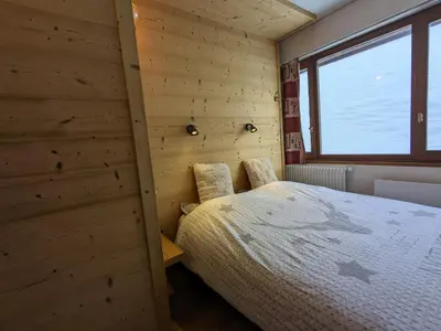 Un ou plusieurs lits dans un hébergement de l'établissement Appartement au lac ski aux pieds