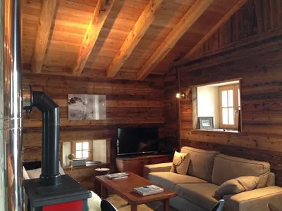 Télévision ou salle de divertissement dans l'établissement Chalet 1692