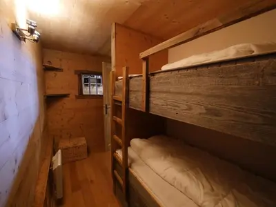 Un ou plusieurs lits dans un hébergement de l'établissement Chalet 1692