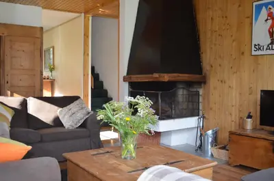 Coin salon dans l'établissement Chalet Reymond Pre du lac