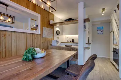 Cuisine ou kitchenette dans l'établissement Le Santel 199