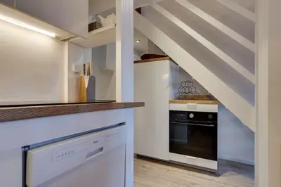 Cuisine ou kitchenette dans l'établissement Le Santel 199