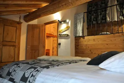 Un ou plusieurs lits dans un hébergement de l'établissement Maison 7 pièces 12 personnes centre station proche pistes - 7 Pièces 12 personnes MAE-4741