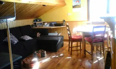 Coin salon dans l'établissement Appartement 3 pièces 5 personnes chaleureux avec vue montagne - 3 Pièces 5 personnes MAE-7735