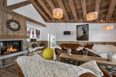 Coin salon dans l'établissement Chalet Chez Sylvain