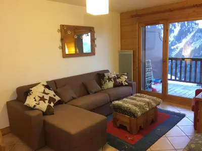 Coin salon dans l'établissement appartement fogliettaz
