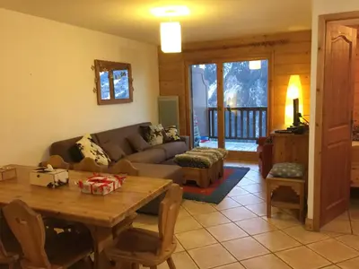 Coin salon dans l'établissement appartement fogliettaz