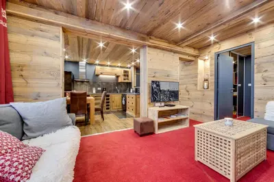 Télévision ou salle de divertissement dans l'établissement Appartement d'exception Tignes