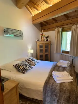Un ou plusieurs lits dans un hébergement de l'établissement Chalet Barmaz
