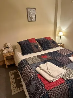 Un ou plusieurs lits dans un hébergement de l'établissement Chalet Barmaz