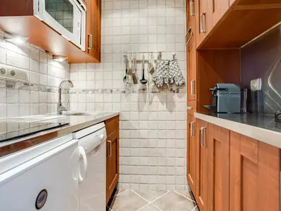 Cuisine ou kitchenette dans l'établissement Apartment Le Prariond - Val Claret-10 by Interhome