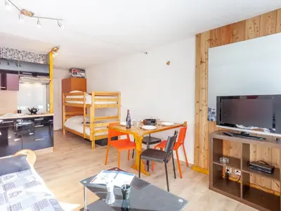 Télévision ou salle de divertissement dans l'établissement Studio Grande Platières II by Interhome