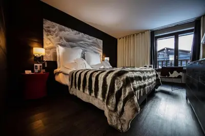 Un ou plusieurs lits dans un hébergement de l'établissement Avenue Lodge Hotel & Spa
