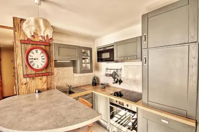 Cuisine ou kitchenette dans l'établissement Appartements résidence Roches Rouges
