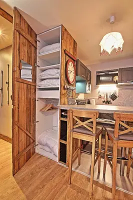 Cuisine ou kitchenette dans l'établissement Appartements résidence Roches Rouges