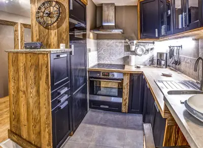 Cuisine ou kitchenette dans l'établissement Appartements résidence Roches Rouges
