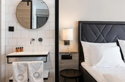 Un ou plusieurs lits dans un hébergement de l'établissement Langley Hôtel Tignes 2100