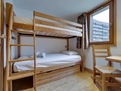Un ou plusieurs lits dans un hébergement de l'établissement Duplex de Standing 4 Chambres, Ski aux Pieds à Tignes le Lac - FR-1-641-106