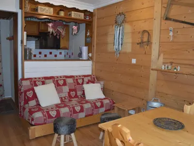 Coin salon dans l'établissement Confortable 2 pièces avec terrasse - Piscine chauffée - FR-1-464-143