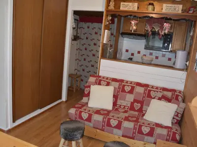 Coin salon dans l'établissement Confortable 2 pièces avec terrasse - Piscine chauffée - FR-1-464-143