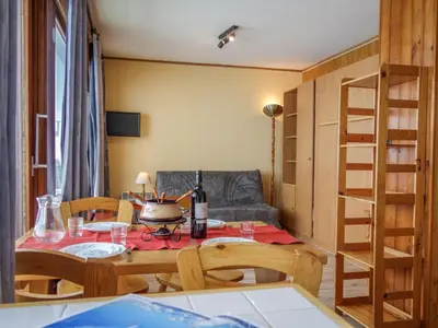 Coin salon dans l'établissement Apartment Les Pistes - Lavachet-2 by Interhome