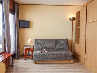 Coin salon dans l'établissement Apartment Les Pistes - Lavachet-2 by Interhome