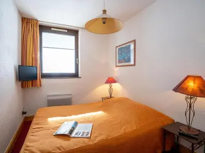 Un ou plusieurs lits dans un hébergement de l'établissement Apartment Les Tommeuses - Val Claret-17 by Interhome