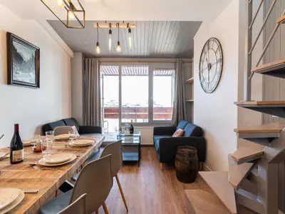 Coin salon dans l'établissement Apartment Le Curling A - Val Claret-9 by Interhome