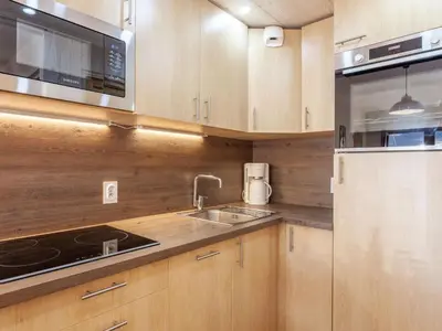 Cuisine ou kitchenette dans l'établissement Apartment Les Tommeuses - Val Claret-2 by Interhome