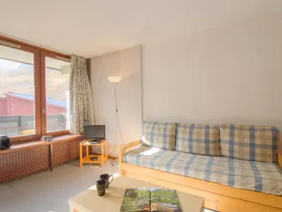Coin salon dans l'établissement Apartment Grandes Platières II-10 by Interhome