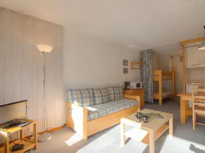 Coin salon dans l'établissement Apartment Grandes Platières II-10 by Interhome