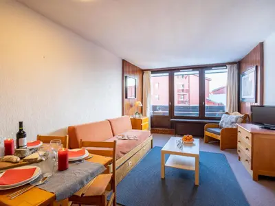 Coin salon dans l'établissement Apartment Les Grandes Platières II by Interhome