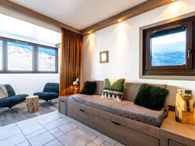 Coin salon dans l'établissement Apartment Plein Soleil - Val Claret-3 by Interhome