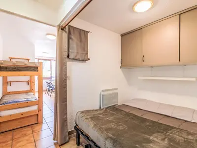 Un ou plusieurs lits dans un hébergement de l'établissement Apartment Les Olympiques - Tignes 1800-4 by Interhome