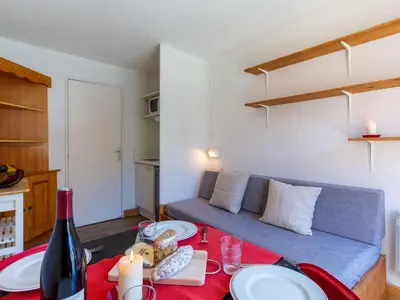 Coin salon dans l'établissement Apartment Chalet Club - Val Claret-4 by Interhome