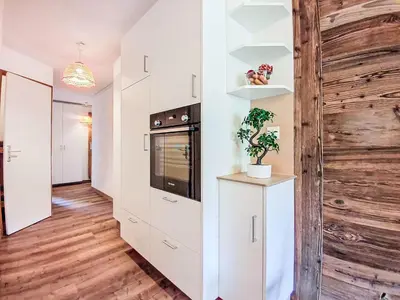 Cuisine ou kitchenette dans l'établissement Apartment La Divaria - Le Lac-6 by Interhome