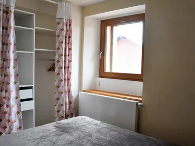 Un ou plusieurs lits dans un hébergement de l'établissement Beau 2 pièces neuf, balcon sud, idéal 4 pers. - FR-1-464-141