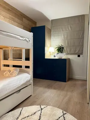 Un ou plusieurs lits dans un hébergement de l'établissement Upstays Cosy Family Ski Near Slopes & Lake
