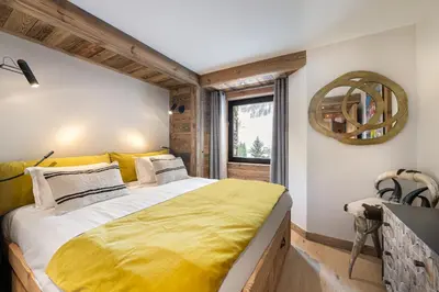 Un ou plusieurs lits dans un hébergement de l'établissement Appartement Flocon - LES CHALETS COVAREL