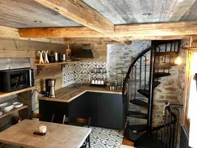 Cuisine ou kitchenette dans l'établissement le mazot d'urbain