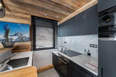 Cuisine ou kitchenette dans l'établissement Appartement Blanchot - LES CHALETS COVAREL