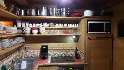 Cuisine ou kitchenette dans l'établissement CHALET GRINCH 90m2, 3 Sdb, skis aux pieds, wifi