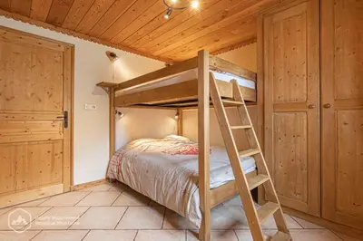 Un ou plusieurs lits dans un hébergement de l'établissement Le chalet d'Emile