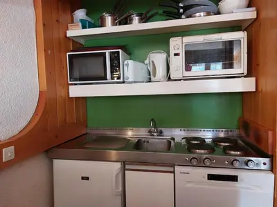 Cuisine ou kitchenette dans l'établissement Appartement 2 pièces, 5 pers, au centre d'Arc 1800, Wifi inclus - FR-1-411-218