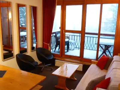 Coin salon dans l'établissement Duplex 3 pièces pour 6 pers., vue vallée, proche pistes, animaux admis à Arc 1800 - FR-1-411-228