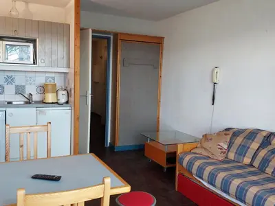 Coin salon dans l'établissement Appartement 2 pièces pour 5 pers., vue vallée, Charmettoger, animaux admis - FR-1-411-231